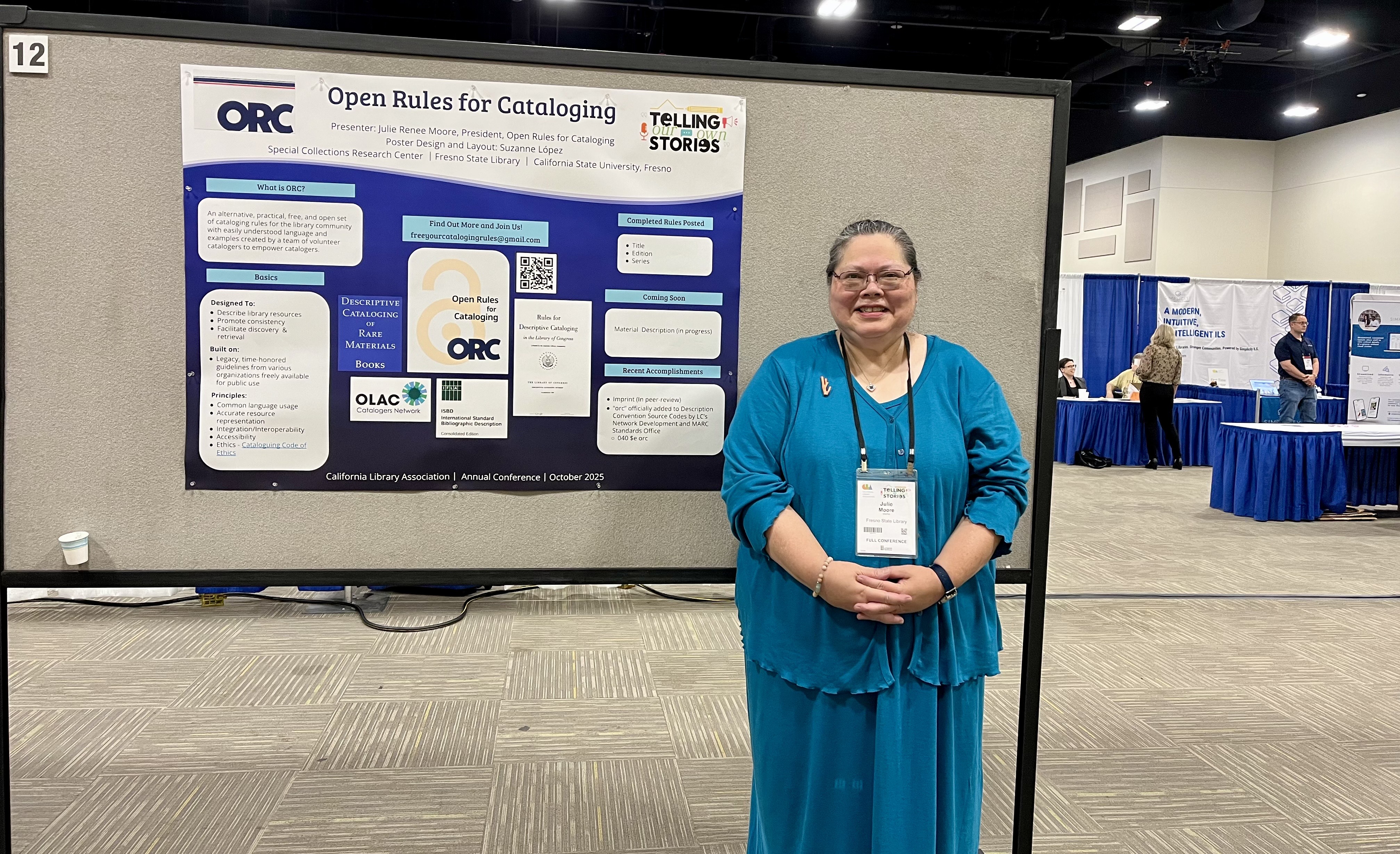 Julie Moore with ORC poster at the California Library Association.